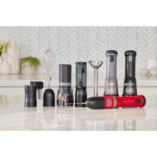 BLACK+DECKER BCKM1016KSG kitchen appliance set, includes red and black hand blender, whisk, and accessories on countertop.