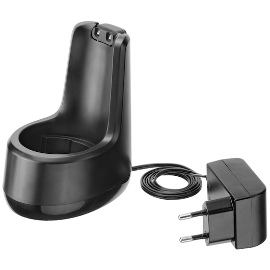 BLACKDECKER BCKM1016KSG black charging base with attached power adapter, side view, photography on white background.