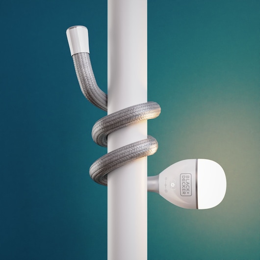 Photo of BLACK+DECKER BDCFSL01 flexible lamp with braided grey arm wrapped around white pole, teal background.