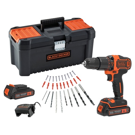 BLACK+DECKER cordless drill set, including an 18V drill, tool box, battery, charger, drill bits, screws, and wall plugs all arranged in front of the tool box.