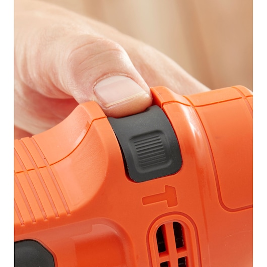 Close-up photo of BLACKDECKER BEH200 power tool switch with textured black button and orange housing.