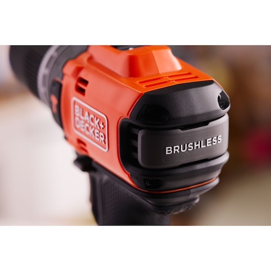 Close-up photo of BLACK+DECKER BLD683D1 brushless cordless drill in orange and black colors.